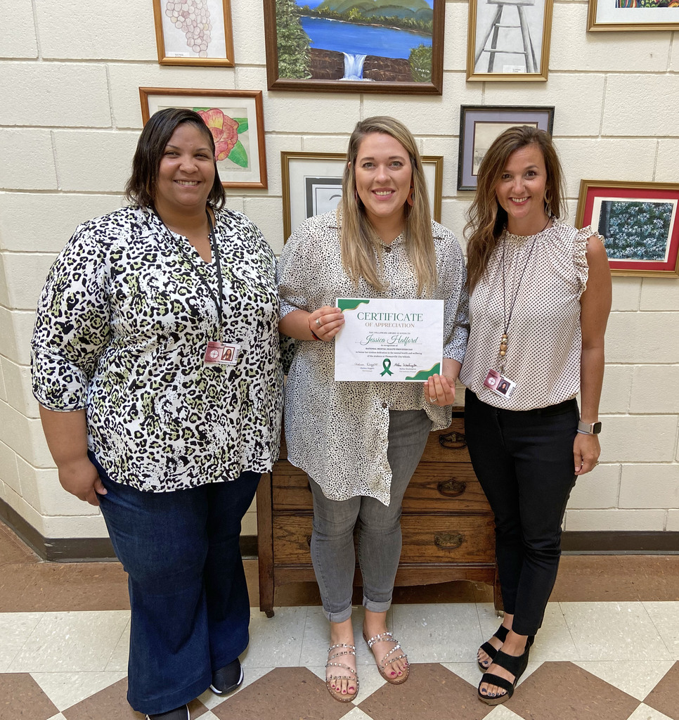 Jessica Halford (center), Mental Health Coordinator for the Thomasville City Schools District, was recognized May 15 for National Mental Health Providers Day. She is pictured with Melisa Washington, Assistant Principal at Thomasville Elementary School; and Chelsea Doggett, TES Principal.