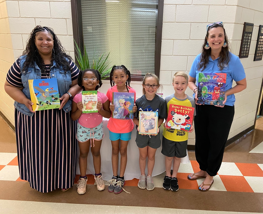 The United Way of Southwest Alabama donated books May 19 to Thomasville Elementary School. Pictured are Melisa Washington, TES Assistant Principal; second grade students Hailey Norwood, Mackenzie Hinson, Sadie Barnes and Mason Smith; and Trista Walker, United Way representative.